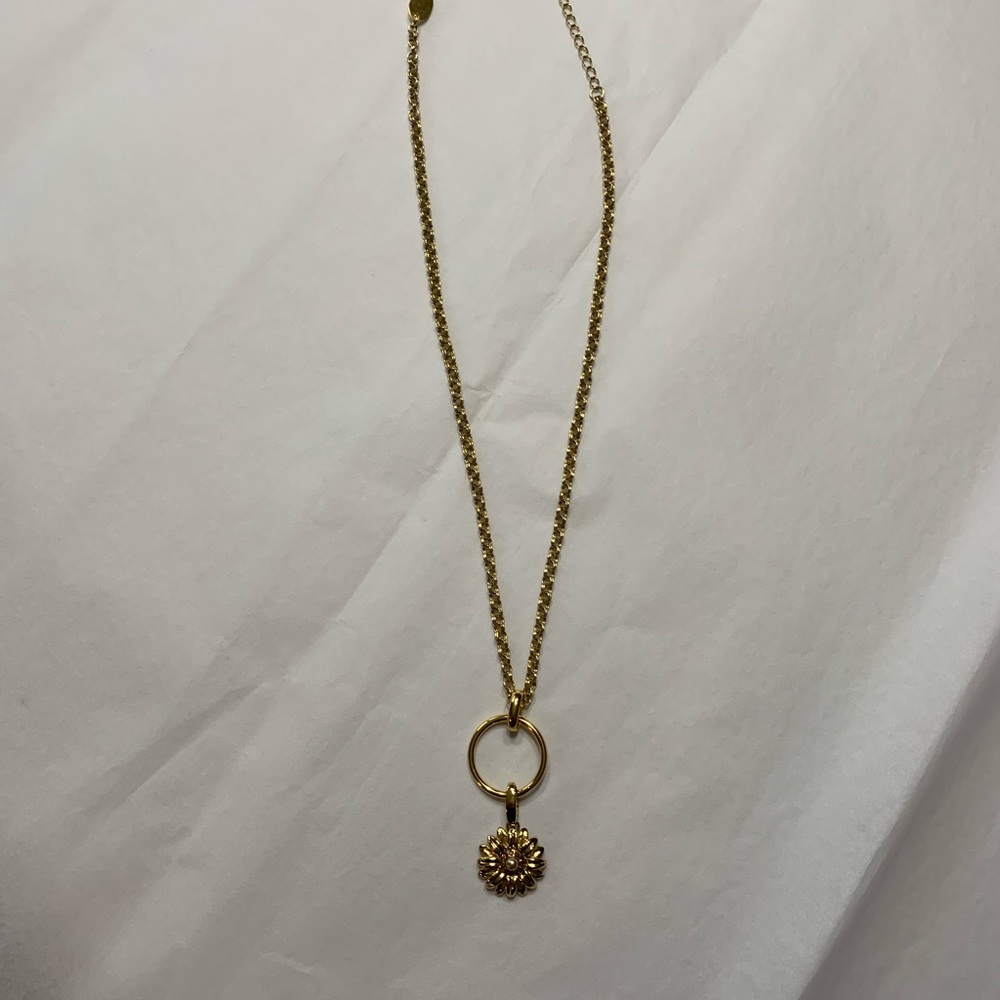 Spartina gold-colored amulet necklace with charm. 17-19” adjustable.